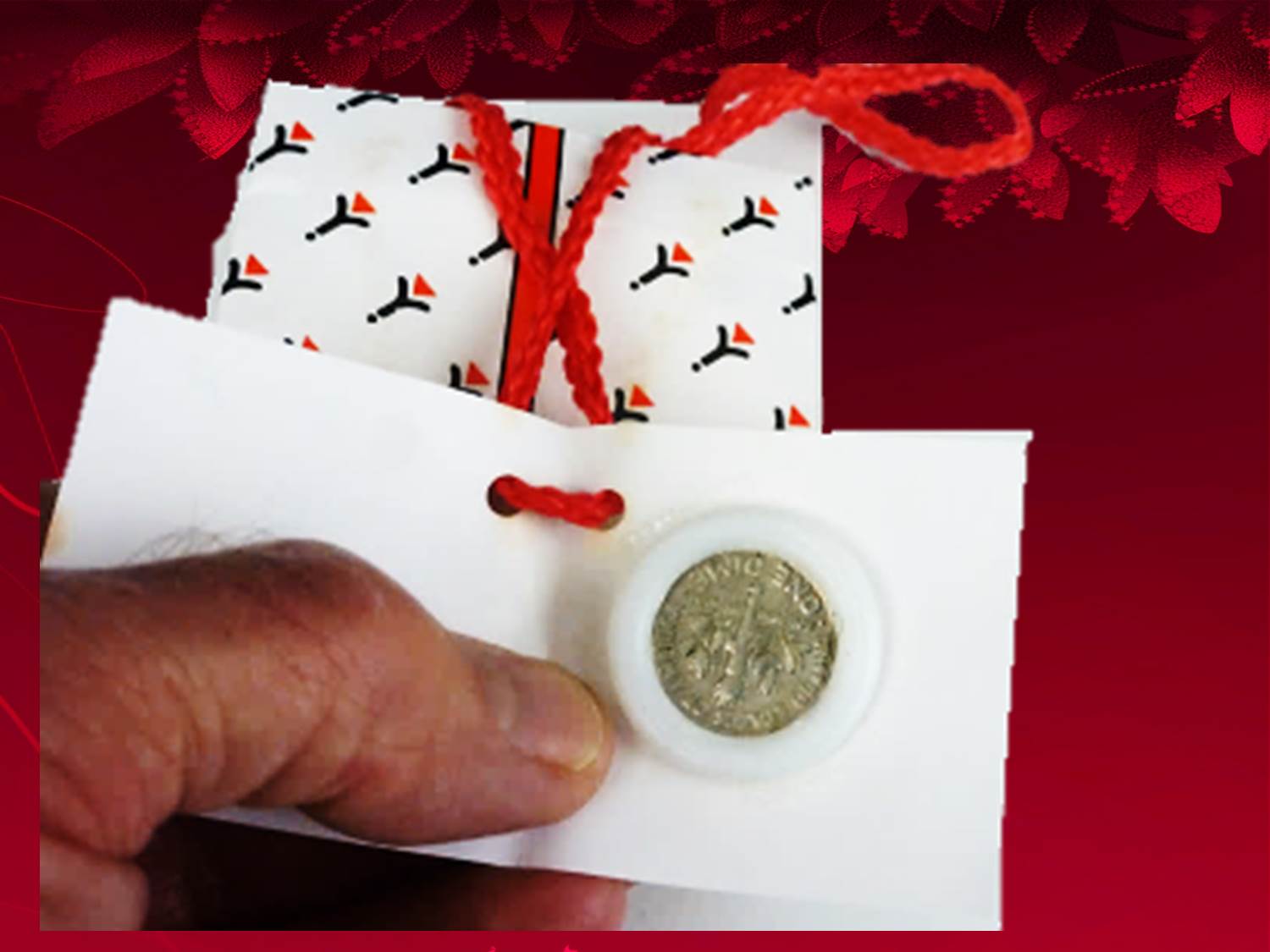 When the gift tag is opened, spectator sees a "Dime n' Ring"!  Spectator is given a dime 'n ring as a souvenir.  Sensational, unforgettable mentalism with an unexpected ending.  Pure Entertainment!